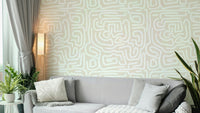 The background of the wallpaper is a soft, light grey.

