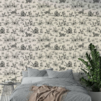 An angled shot of a wall with animal wallpaper


