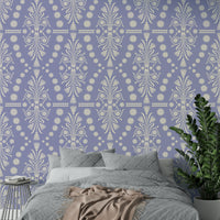 An angled shot of a wall with intricate wallpaper

