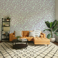 An angled shot of a wall with flower wallpaper

