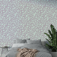 Sketched flowers wallpaper on a bedroom wall

