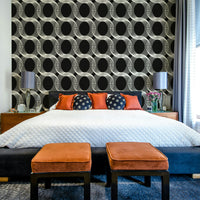 The image features a repeating design of linear circles.
