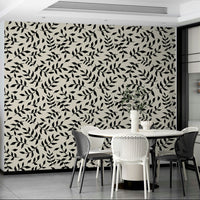A full-wall mural showing a pattern of tiny twigs.
