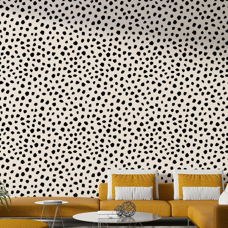 Irregular black spots wallpaper on a living room wall


