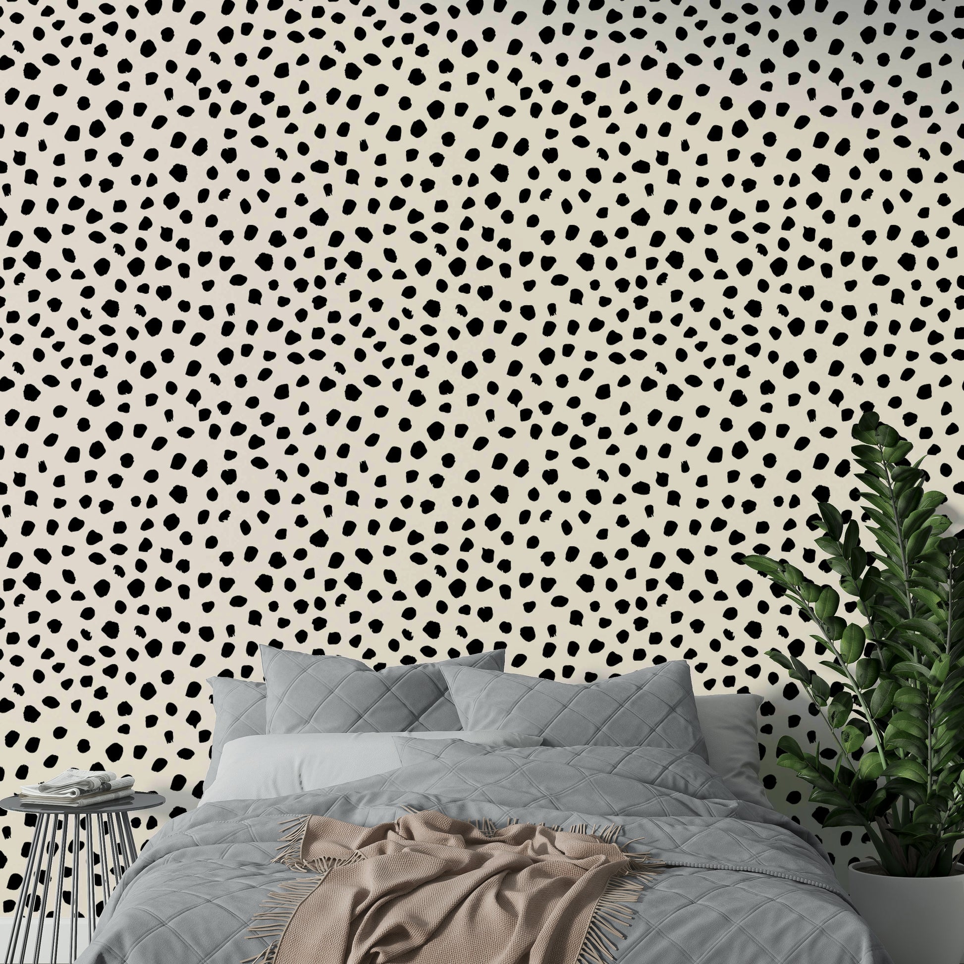 A modern office decorated with a black spots mural

