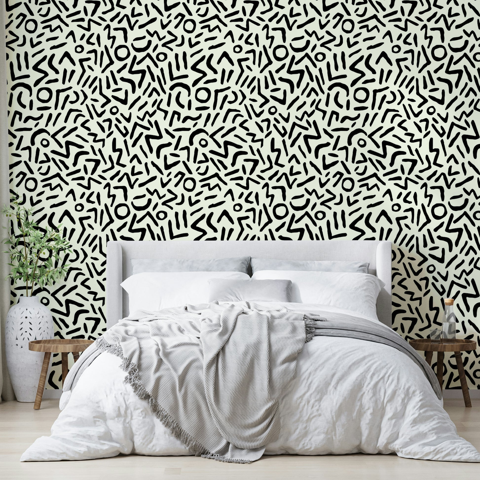 Hand drawn abstract tribal wallpaper on a living room wall

