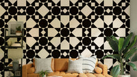 Geometric star wallpaper on a living room wall

