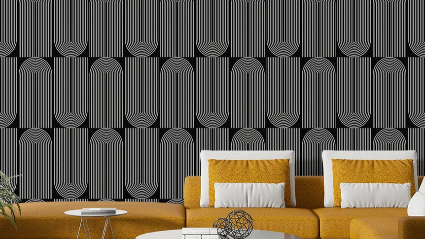 An angled shot of a wall with abstract wallpaper

