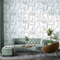 Artistic Faces Wallpaper on a living room wall

