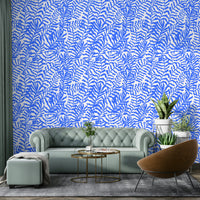 Wall mural with blue abstract leaves.
