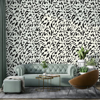 Artistic scribble wallpaper for a child's room.
