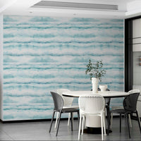 Blue watercolor clouds wall mural.
