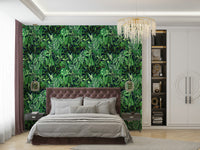 A full-wall mural showing a dense tropical scene.
