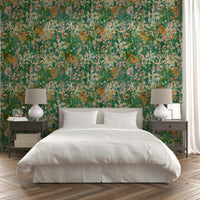 The wallpaper is used as a feature wall in a bedroom.

