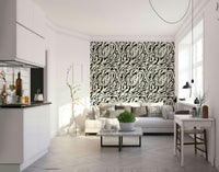 The wallpaper is used to create a feature wall in a dining room.

