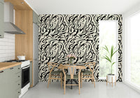 A minimalist home office with the painted lines wallpaper.

