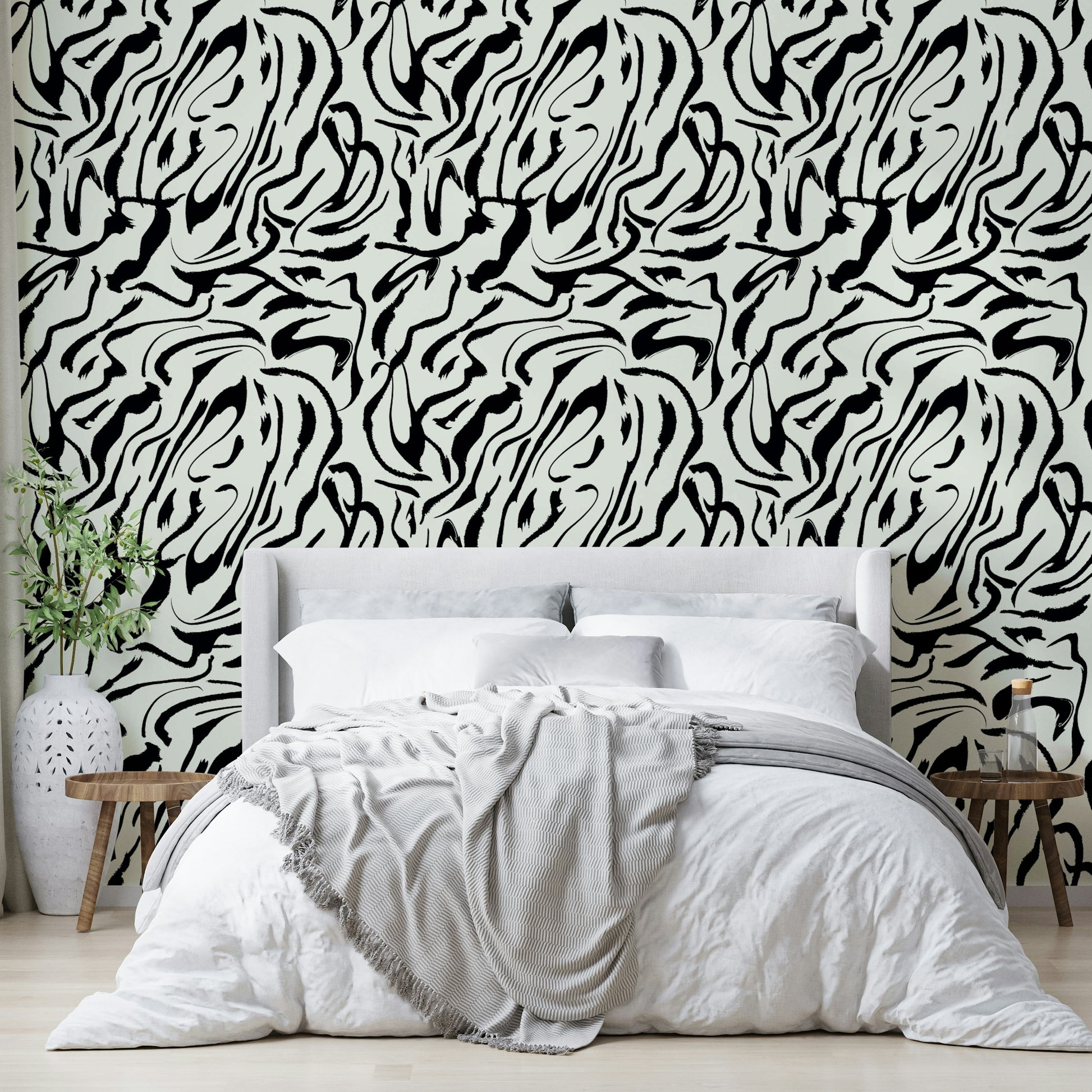 The peel and stick wallpaper on a smooth wall surface.

