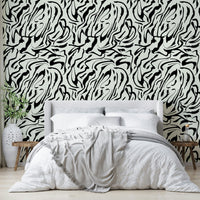 The peel and stick wallpaper on a smooth wall surface.

