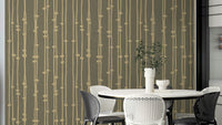 The wallpaper is used to create a feature wall in a dining room.