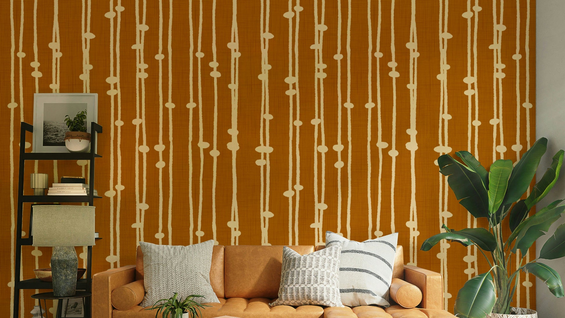 A contemporary living room with a boho striped wall mural.