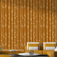 The peel and stick wallpaper on a smooth wall surface.