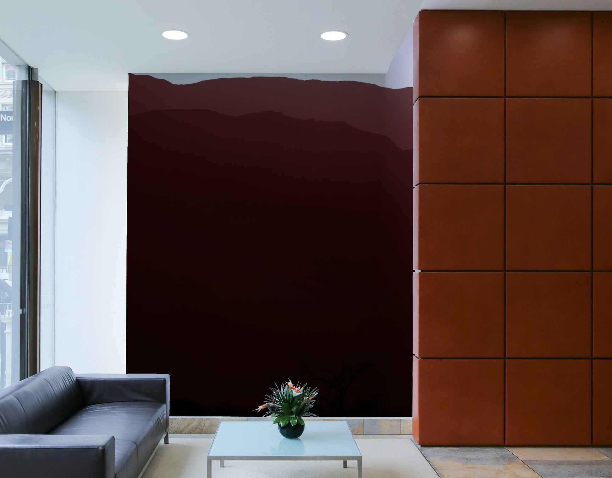 A bedroom with the wall mural behind the headboard.