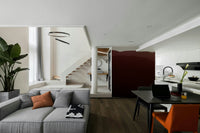 A close-up of the layered, misty mountains at dusk.