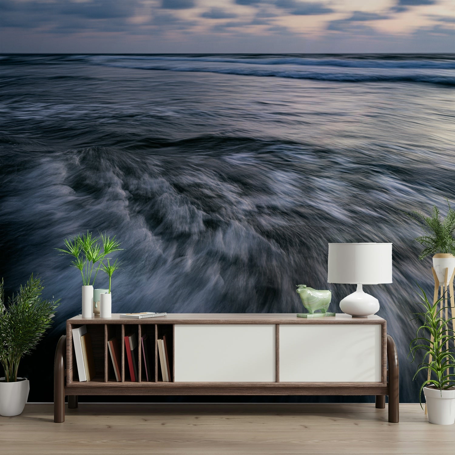A contemporary living room with a large ocean wave wall mural.