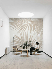 A fashion-forward jungle mural on decorative wallpaper.

