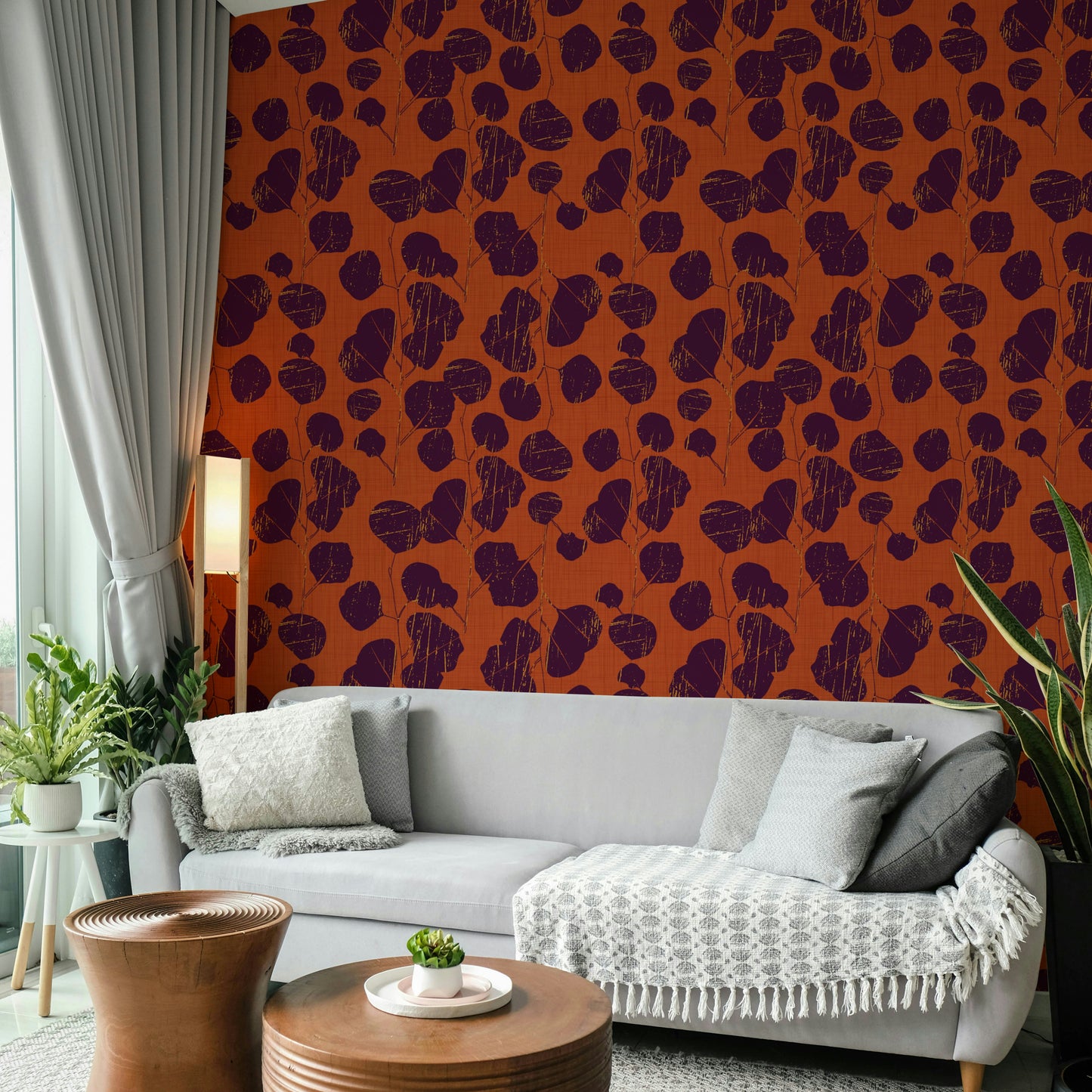 A bohemian plum leaf mural on decorative wallpaper.


