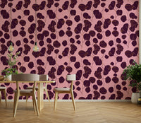 A tasteful botanical wall mural of plum leaves.


