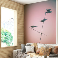 A beautiful pink and blue botanical wallpaper mural.

