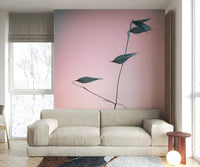 A calming single stem mural in a gradient wallpaper.

