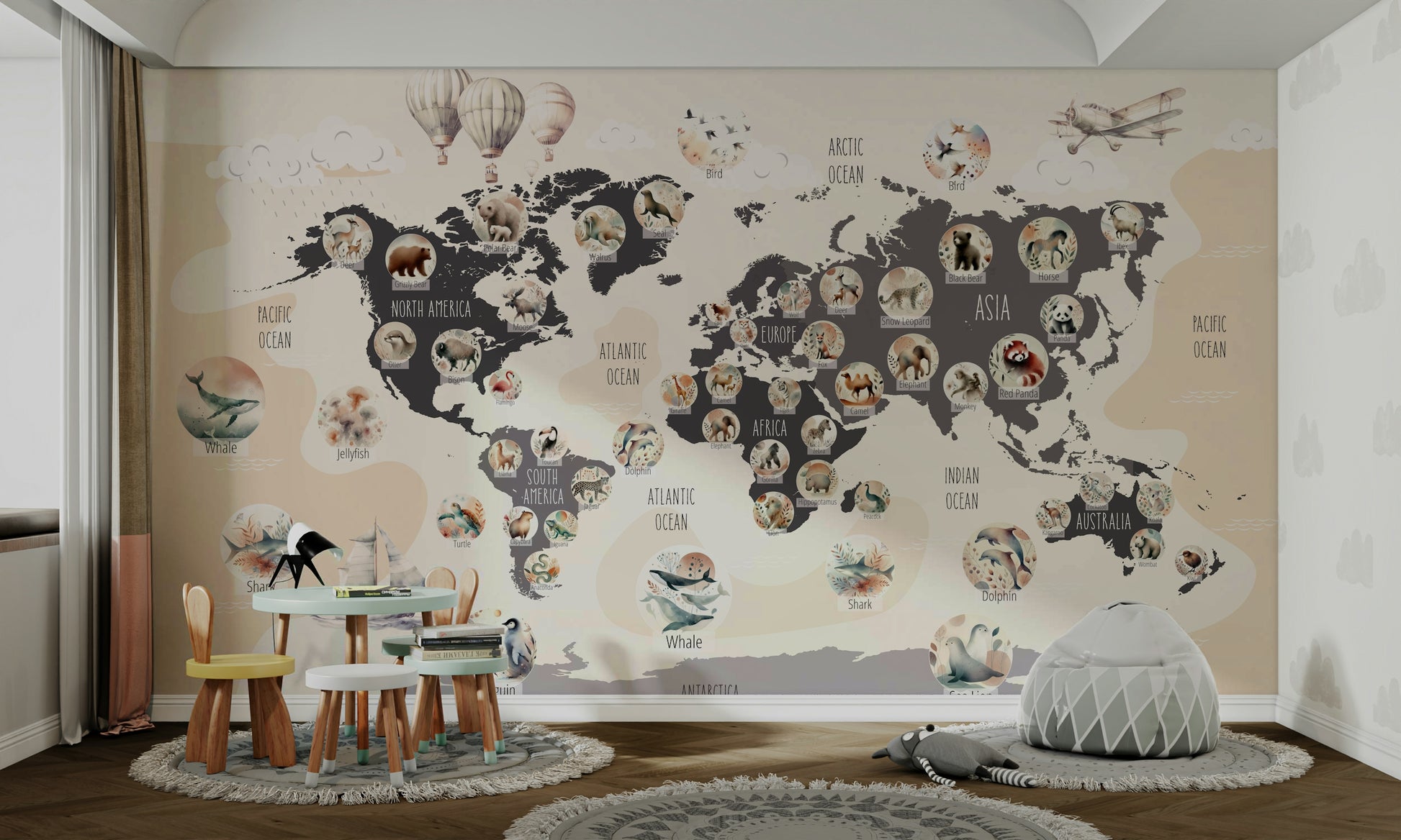 A living room featuring the animal map wall mural.

