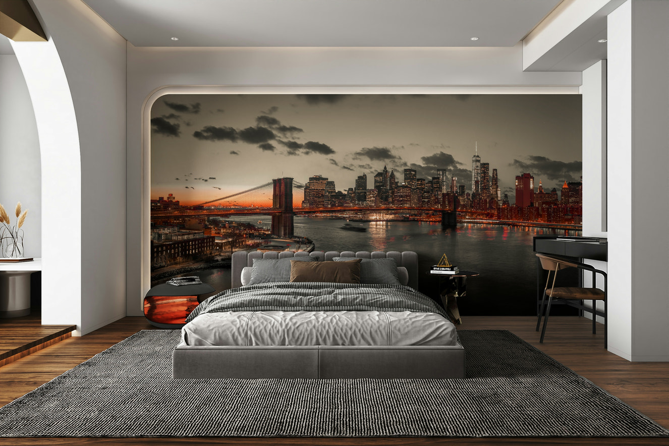 A beautiful, panoramic view of the Lower Manhattan skyline at dusk.

