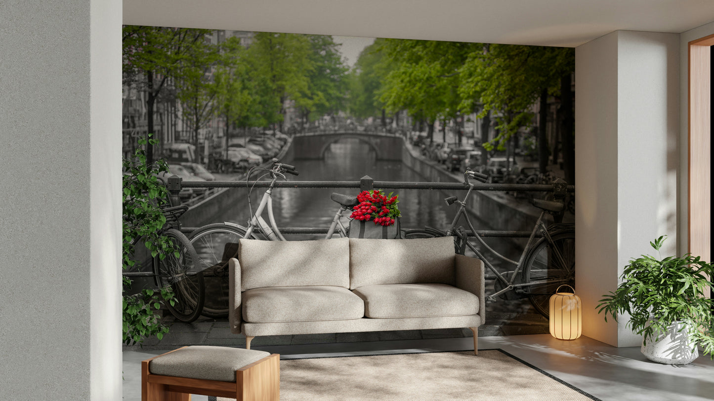 A living room featuring the iconic Amsterdam wall mural.

