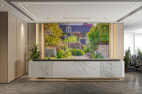 A high-angle view of the wall mural in a large space.

