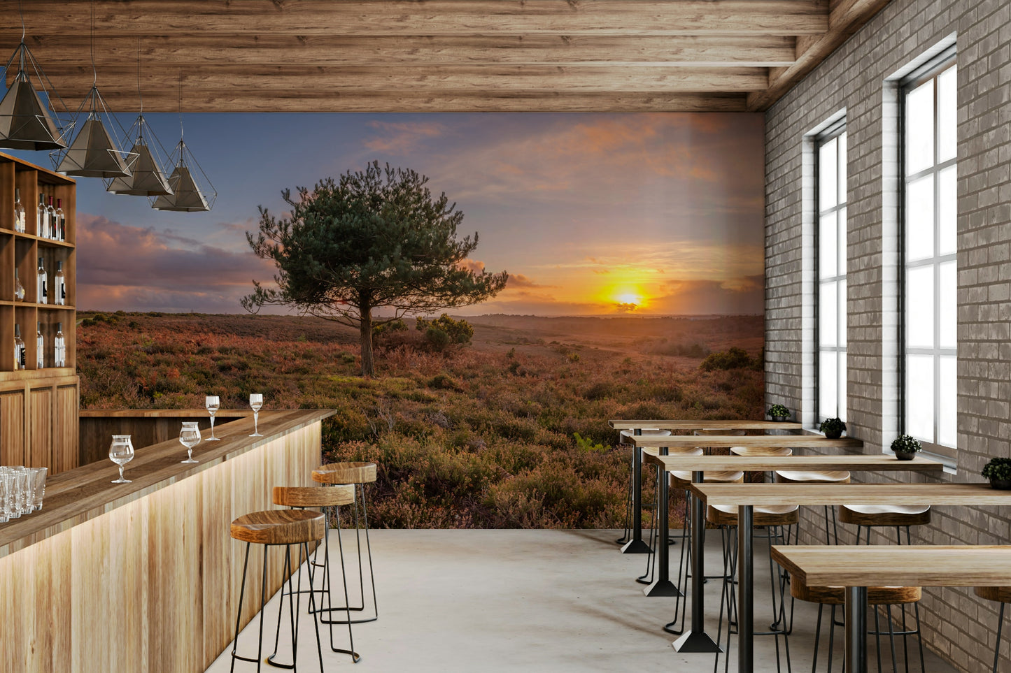 A peaceful tree silhouette mural on decorative wallpaper.

