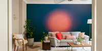 A blurred orange sun wall mural for contemplative decor.

