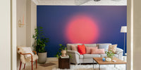 An artistic abstract sun mural on minimalist wallpaper.

