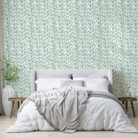 A serene botanical wall mural for a bedroom.

