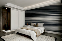 A graceful wave motion wall mural in cool, natural tones.

