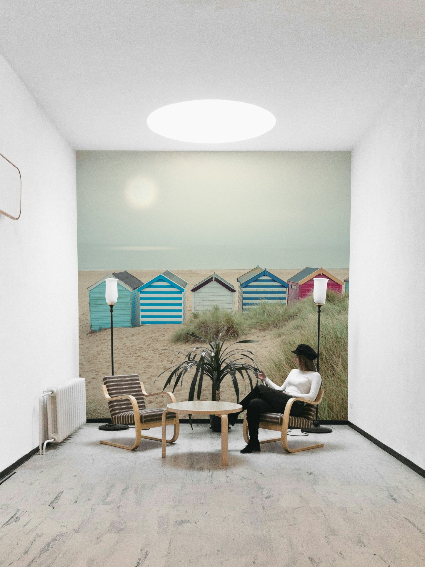 A graceful seaside shack wall mural in bright, fun tones.

