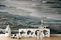 An artistic winter wave mural on minimalist wallpaper.

