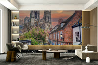 A peaceful charming street mural on decorative wallpaper.

