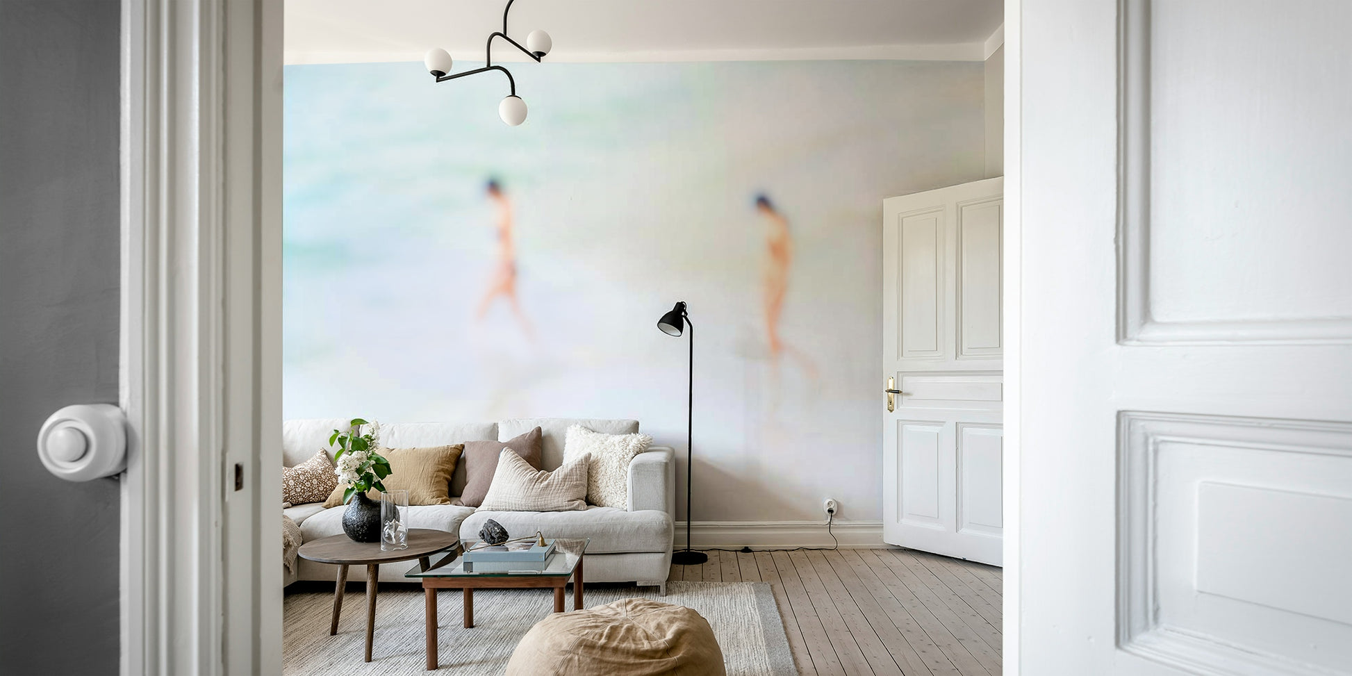 A peaceful seaside view mural on decorative wallpaper.

