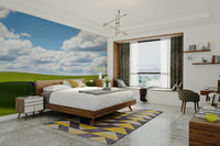 A peaceful open vista mural on decorative wallpaper.

