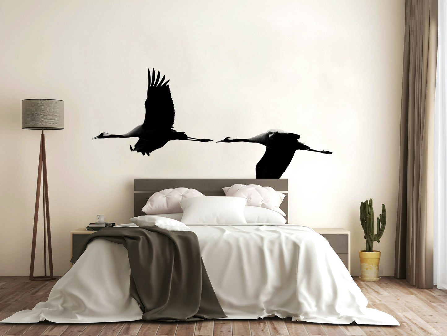 An artistic elegant crane mural on minimalist wallpaper.

