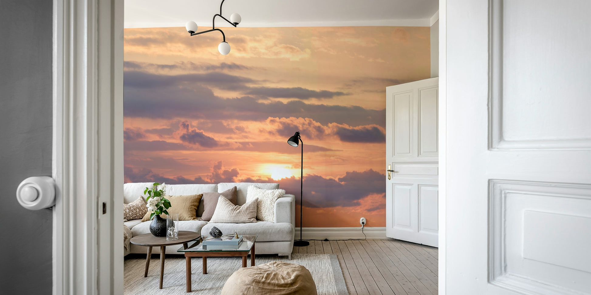 An artistic glowing sunset mural on minimalist wallpaper.

