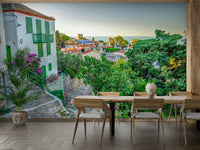A peaceful Greek island mural on decorative wallpaper.

